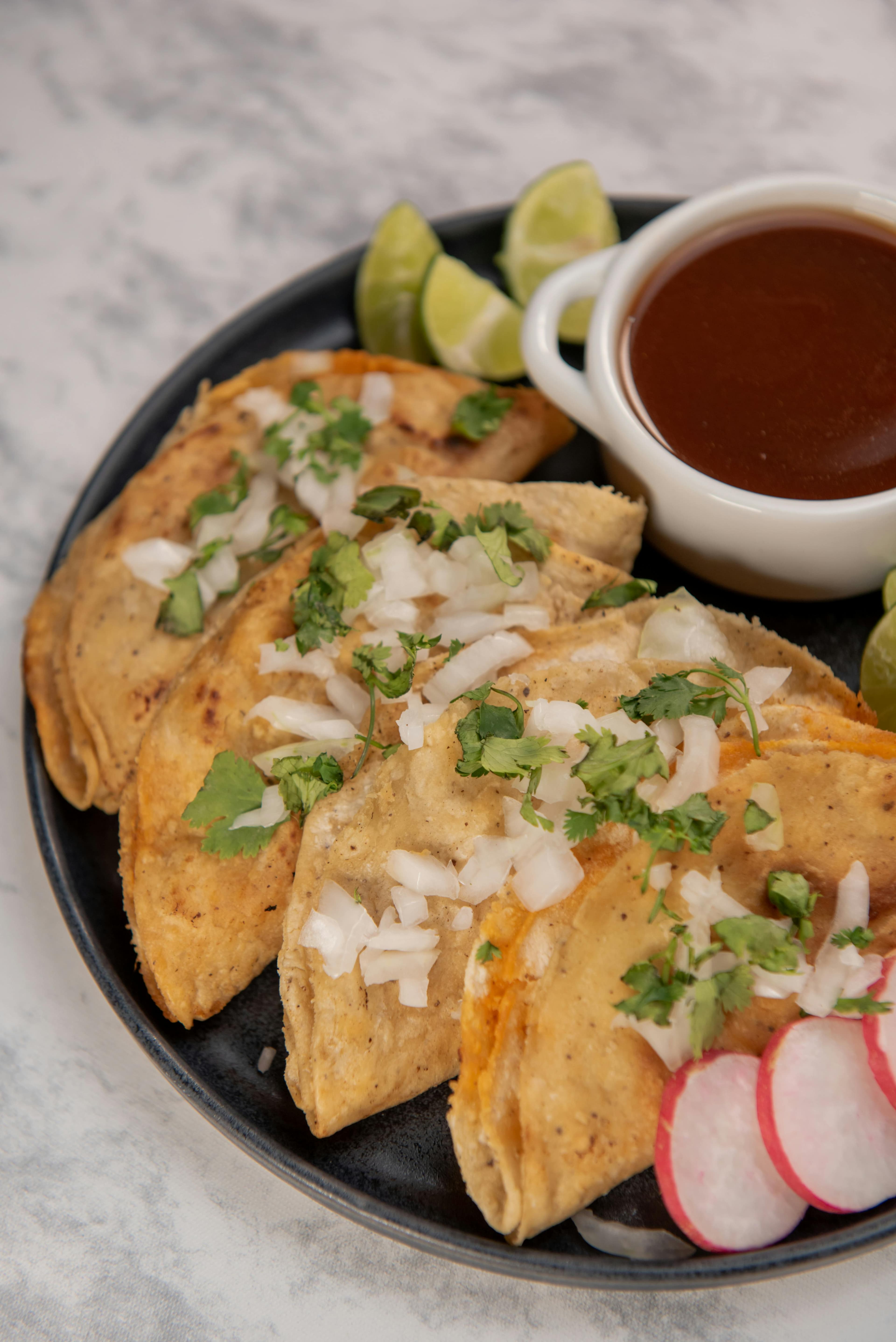 One taco, one enchilada, and choice of rice or beans.